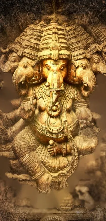 Golden elephant sculpture wallpaper with intricate design.