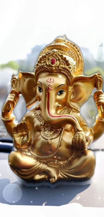 Golden Lord Ganesha figurine on display.