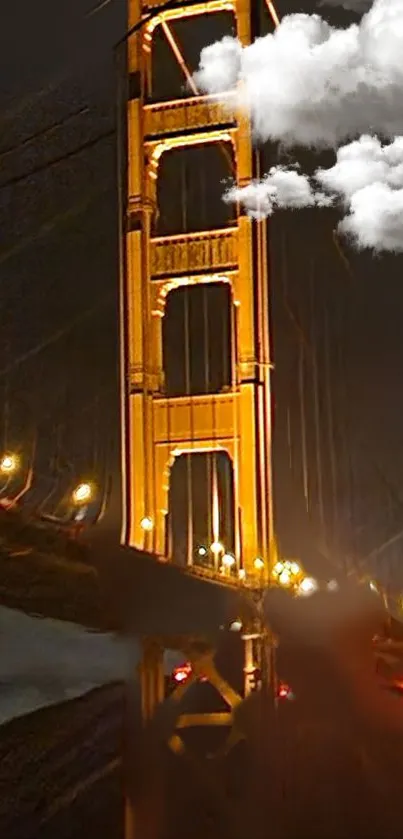 Night view of Golden Gate Bridge with clouds.