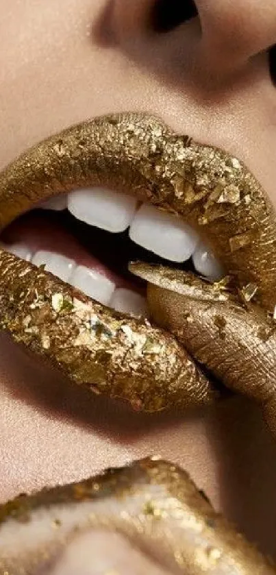 Close-up of gold-pigmented lips and teeth in glamorous design.