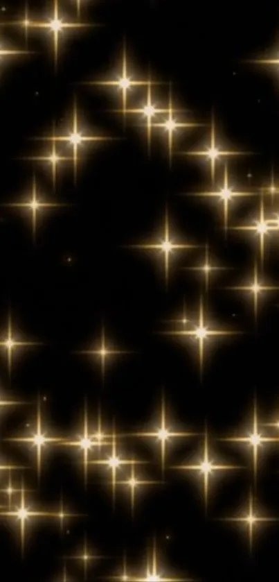 Golden glitter stars sparkling on a dark background wallpaper.