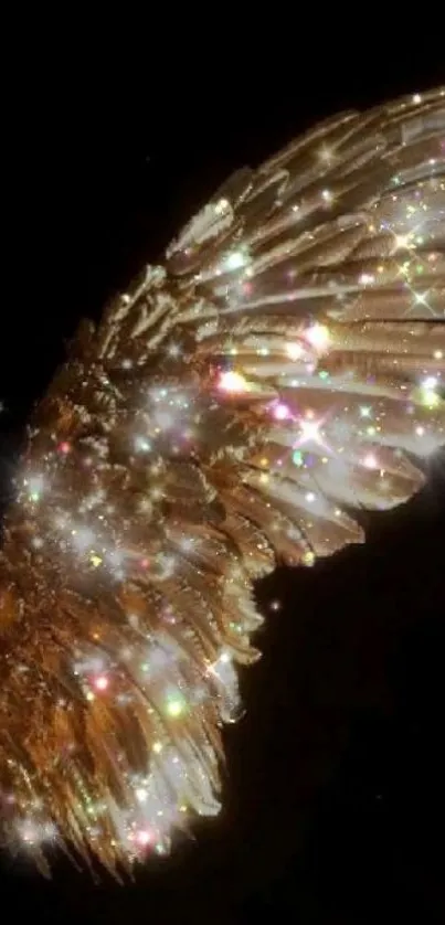 Elegant golden angel wings with sparkling glitter on a black background.