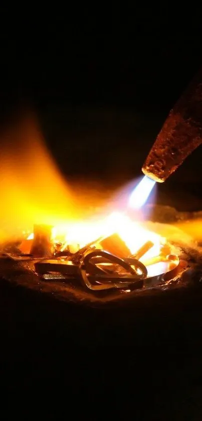 Golden glow of mechanical equipment with blue flame on dark background.