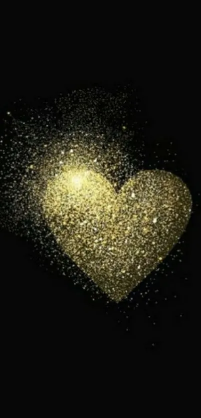 Golden glitter heart on black background.