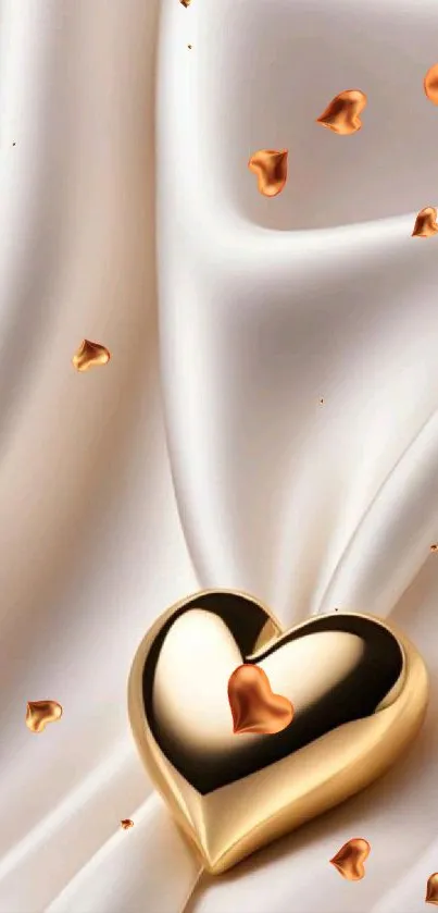 Golden heart on white silk with petals.