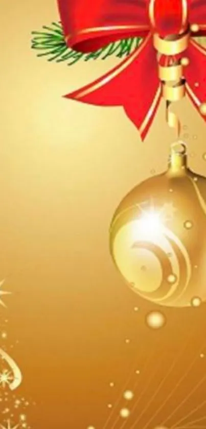 Golden ornament with red bow on festive wallpaper.