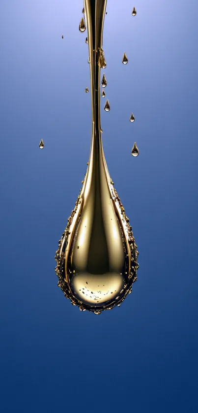 Golden liquid drop with blue background wallpaper.