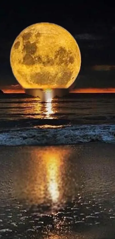 Moonlit beach with a golden full moon reflecting over the ocean