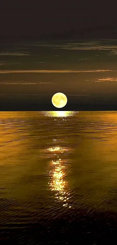 Golden moonlit ocean reflecting serene night sky.