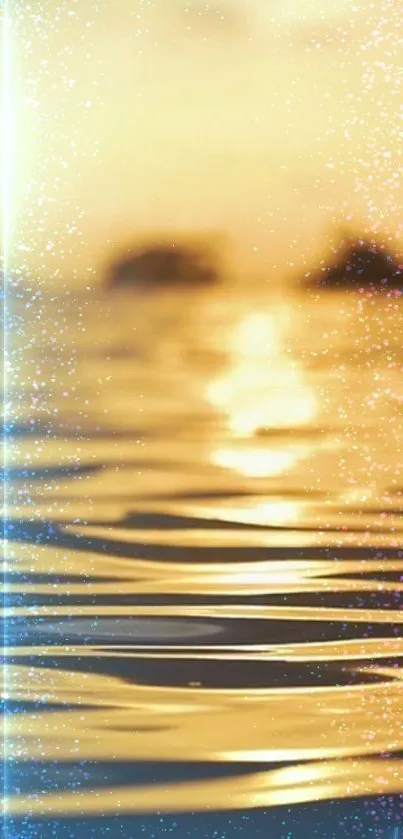 Golden ocean with shimmering water at sunset, creating a serene mobile wallpaper.