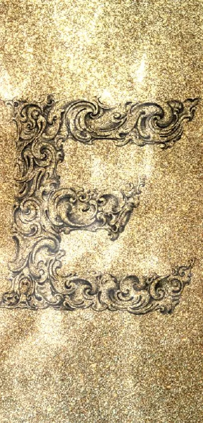 Golden ornate letter 'E' on a textured background.