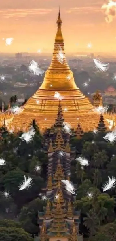 Golden pagoda with floating feathers at sunset, creating a serene atmosphere.