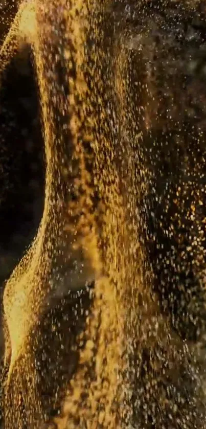 Golden particles flow on a black background in dynamic motion.