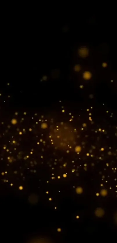 Golden particles on a black background creating an elegant phone wallpaper.