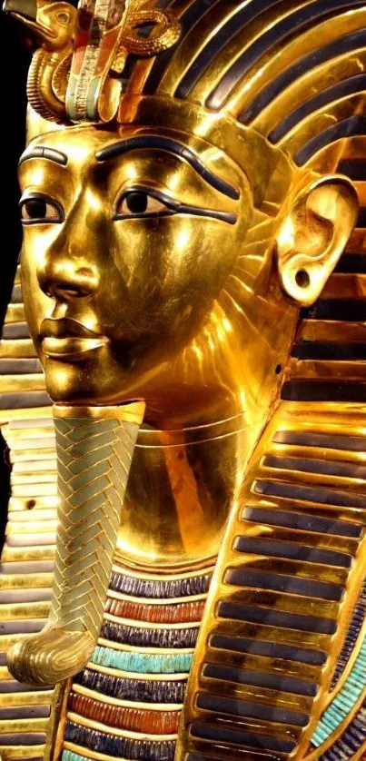 Golden pharaoh mask on black background mobile wallpaper.