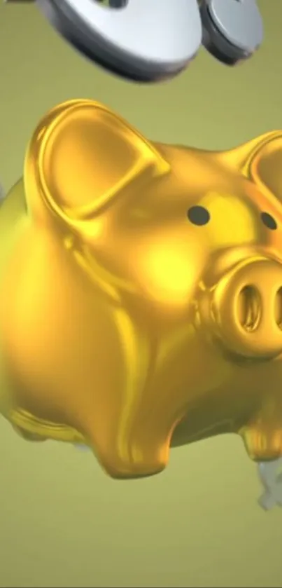 Golden piggy bank on a yellow background, symbolizing wealth and prosperity.