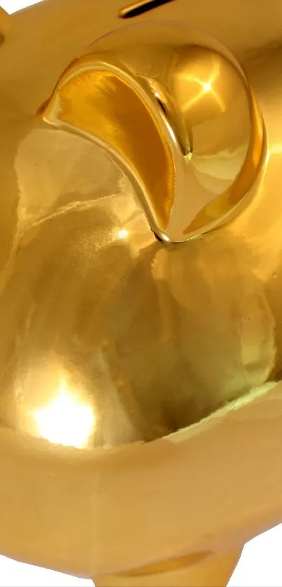 Golden piggy bank with shiny finish.