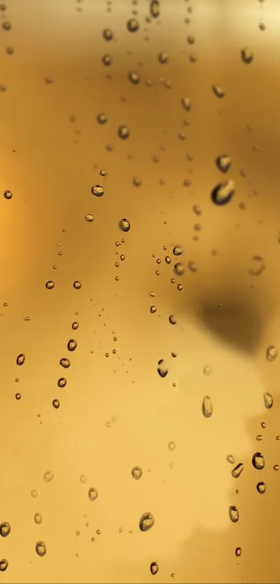 Golden wallpaper with raindrop texture on a mobile screen.