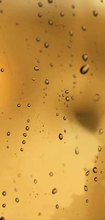 Golden raindrop wallpaper with elegant droplets on a luxurious gold gradient.