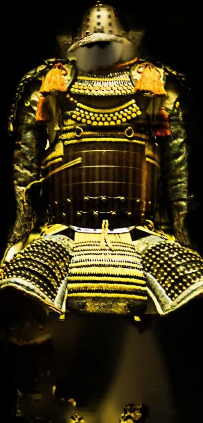 Golden samurai armor with detailed design on a dark background.