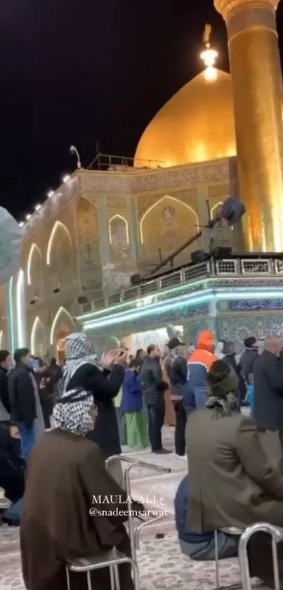 Golden shrine illuminated at night with spiritual ambiance.