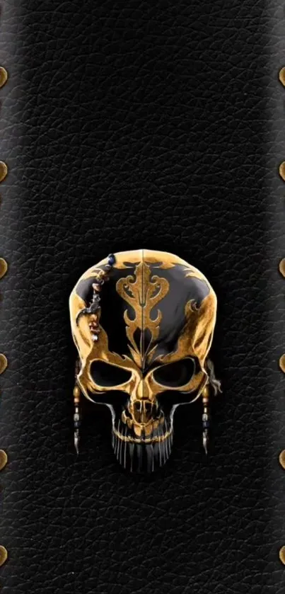 Golden skull on black leather wallpaper with intricate details.