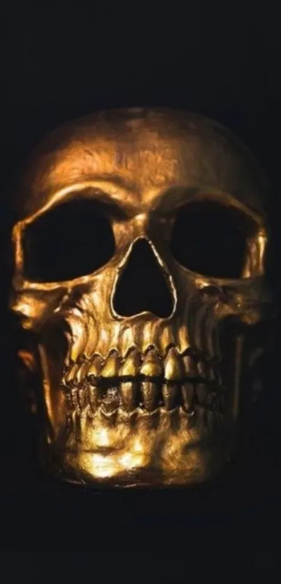 Golden skull wallpaper with dark background.