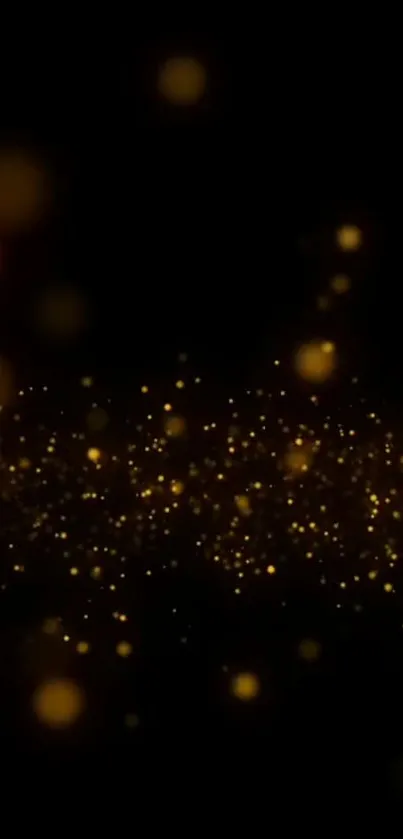 Golden sparkle wallpaper with a dark background and luminous particles.