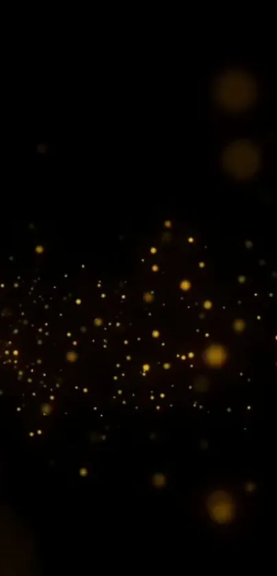 Golden sparkles on black background, elegant night wallpaper.