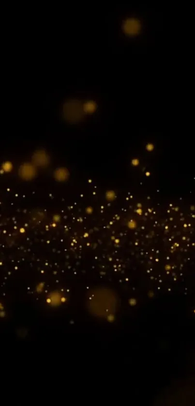 Golden sparkles on a black background create an elegant phone wallpaper.