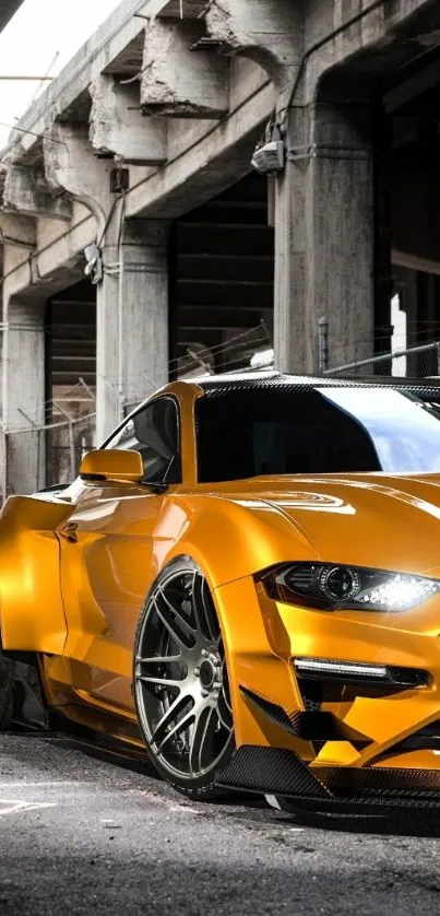 Golden sports car under urban bridge setting.