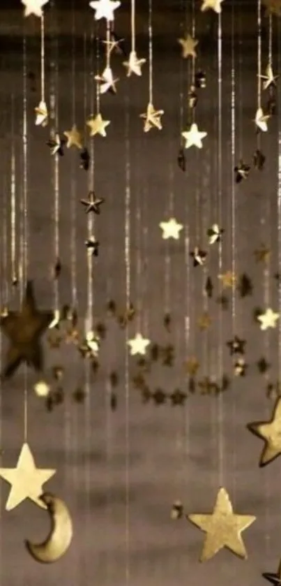 Golden stars hanging in a dark backdrop, creating a celestial mobile wallpaper.