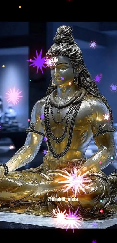 Golden statue of meditating deity with starry accents on a dark background.