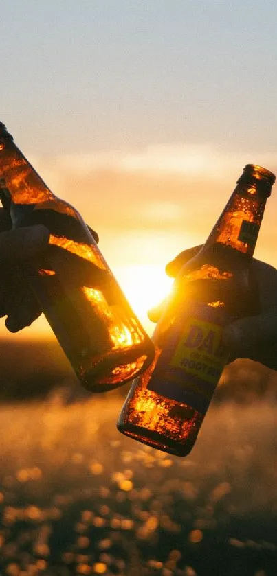 Two bottles clink at sunset with golden hues.