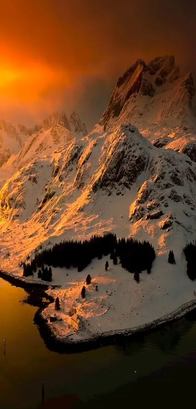 Golden sunset over snowy mountains with orange sky.