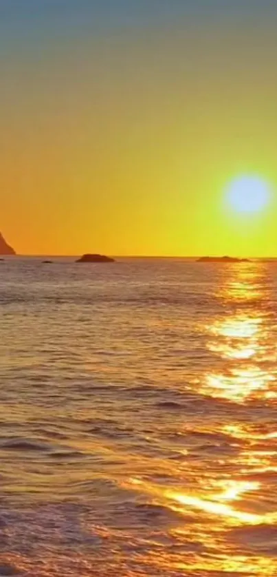 Beautiful golden sunset over a tranquil ocean horizon.