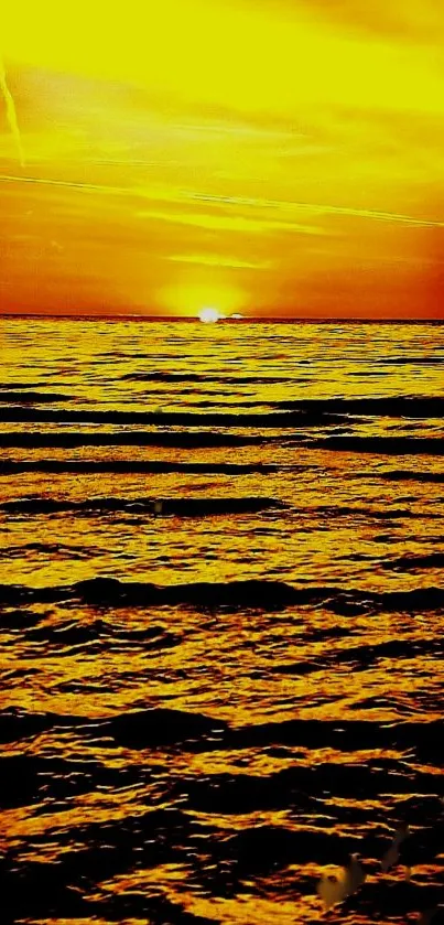 Golden sunset over ocean waves, vibrant and tranquil.