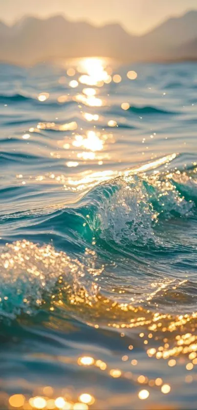 Golden sunset reflecting on ocean waves with distant mountains.