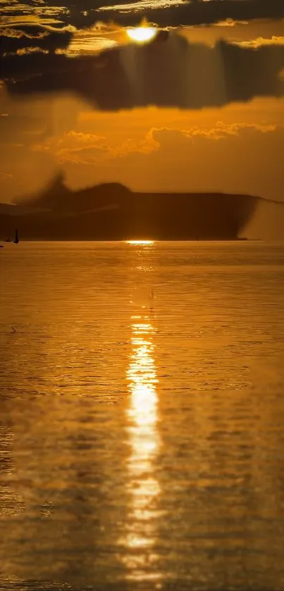 Golden sunset reflecting over calm waters with serene natural beauty.