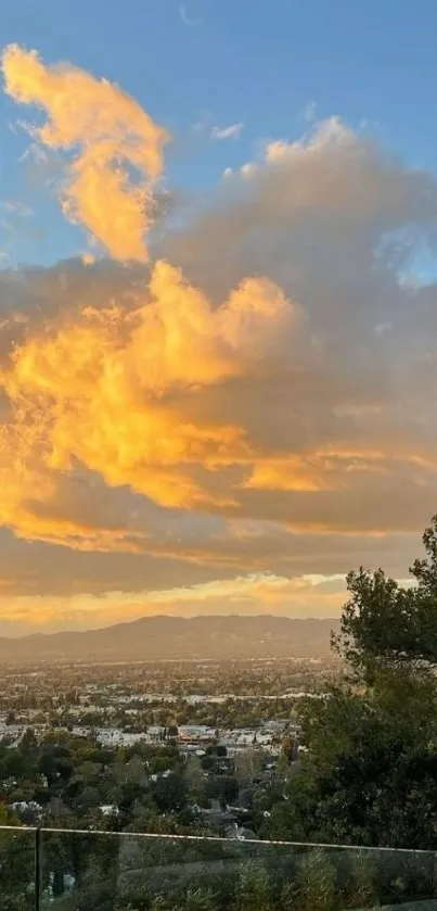 Golden sunset over cityscape with clouds and trees.