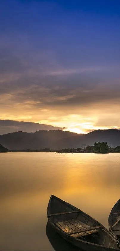 Sunset over lake with two boats on calm water.