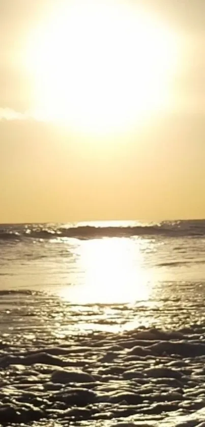 Golden sunset over calming ocean waves.