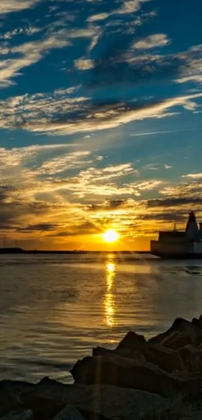 Golden sunset over tranquil waters with a distant ship.