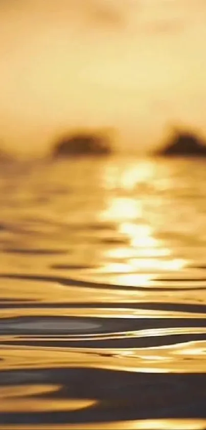 Golden sunset reflecting on rippling water, creating a serene and tranquil ambiance.