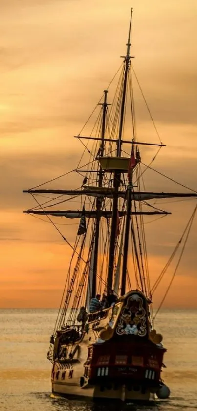 Majestic ship sailing into a golden sunset on the ocean.