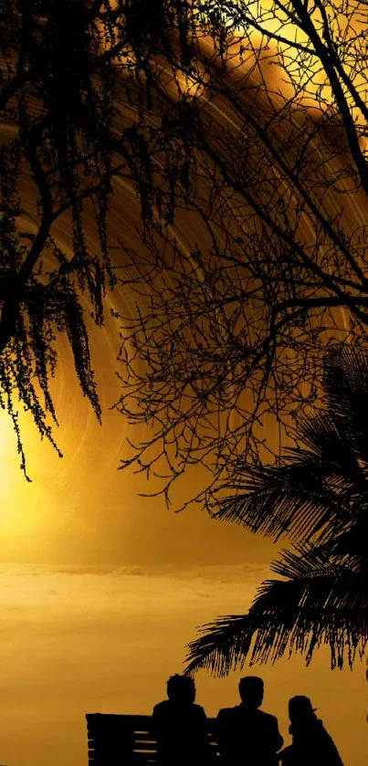 Silhouettes against a golden sunset with trees.