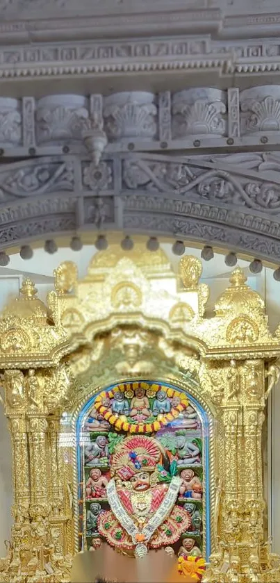 Golden deity in ornate temple setting, rich with cultural and spiritual ambiance.