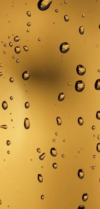 Golden raindrop texture on phone wallpaper background.