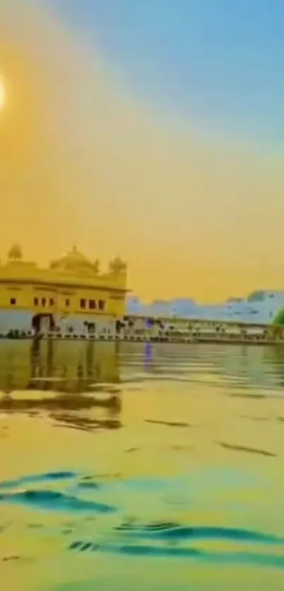 Golden temple reflecting in serene water under a vibrant sky at sunset.