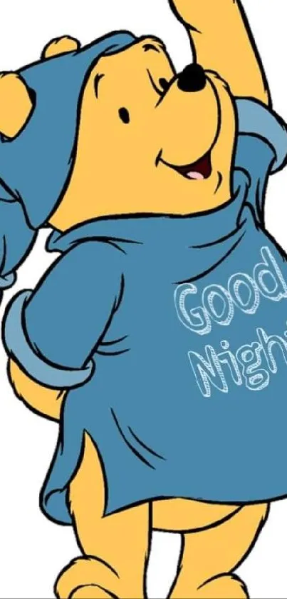 Cartoon bear in blue nightgown says 'Good Night'.